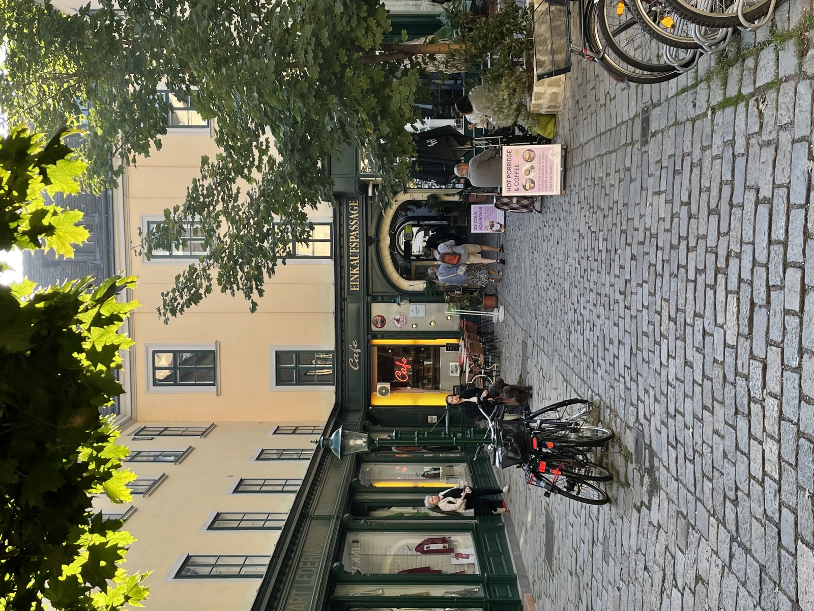 People outside a cafe in summer